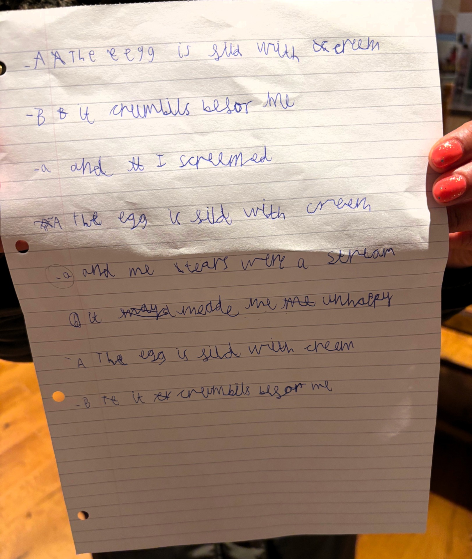 A photo of Lucas’s handwritten Easter triolet on a piece of paper, with the poem written in blue pen.