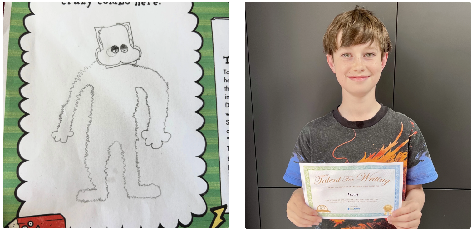 Boy holding a certificate in front of a gray backdrop, alongside a child’s drawn animal picture.