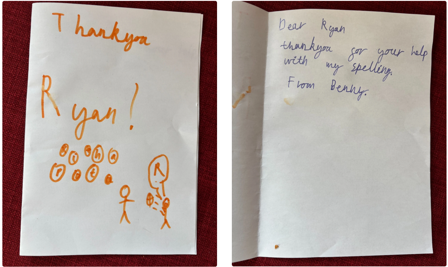 Two handwritten letters on white paper on a red fabric background, thanking and greeting someone.